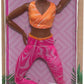 Barbie Made to Move Fashion Doll with Black Hair Wearing Removable Yellow Sports Top & Pink Yoga Pants, 22 Bendable Joints