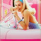 Barbie The Movie Doll Wearing Pink and White Gingham Dress with Daisy Chain Necklace for Ages 3 Years and Up