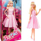 Barbie The Movie Doll Wearing Pink and White Gingham Dress with Daisy Chain Necklace for Ages 3 Years and Up